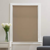 Cappuccino thermal blackout roller blind fully extended on window