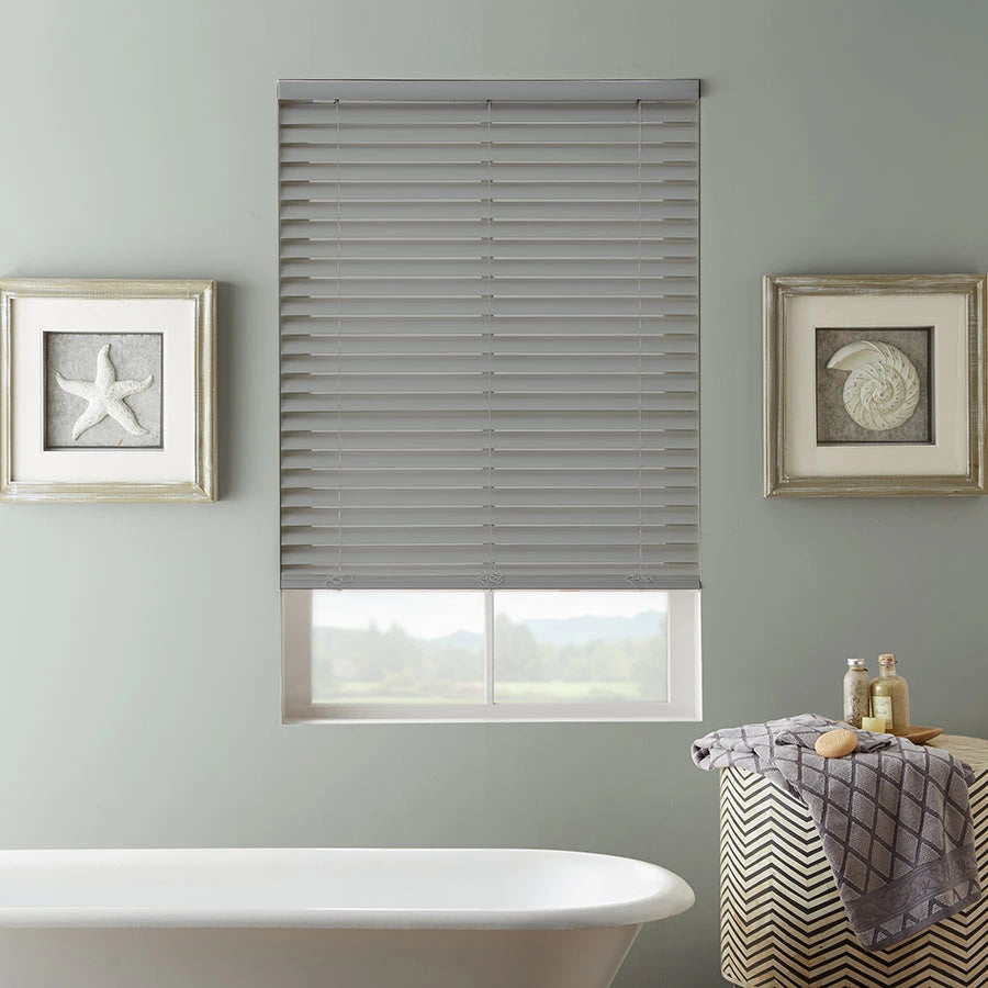 Grey faux wood Venetian blind with 50mm slats installed in a contemporary living space or bathroom