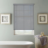 Close-up of 50mm slats and decorative tape joins on grey faux wood blind