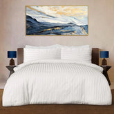 Hotel quality cotton satin stripe duvet cover set with pillowcases on a bed