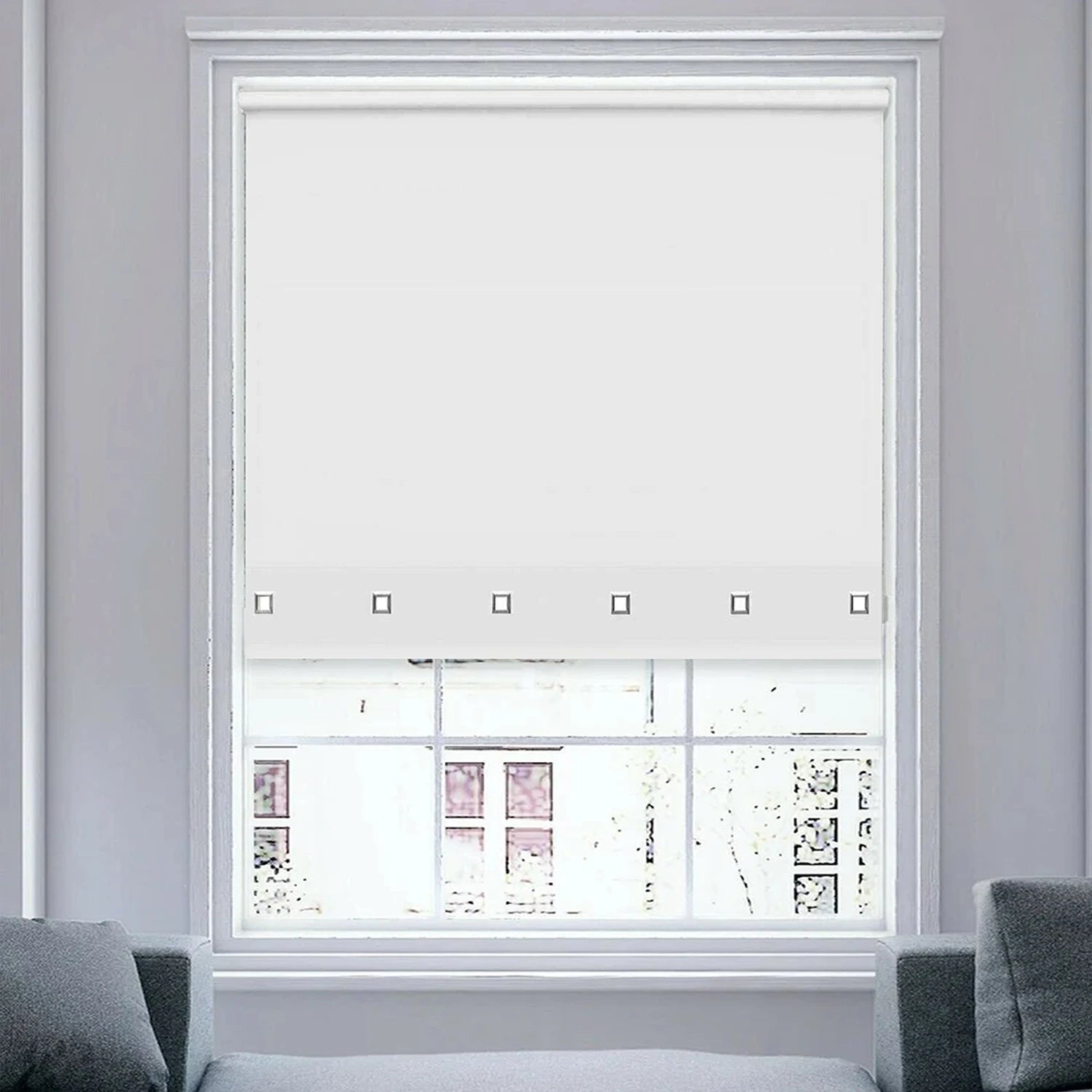 Front view of white square eyelet light filtering roller blind fully extended on window