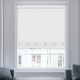 Front view of white square eyelet light filtering roller blind fully extended on window