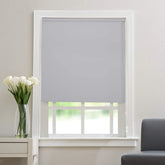 White thermal blackout roller blind with 3-pass fabric for full light block and UV protection