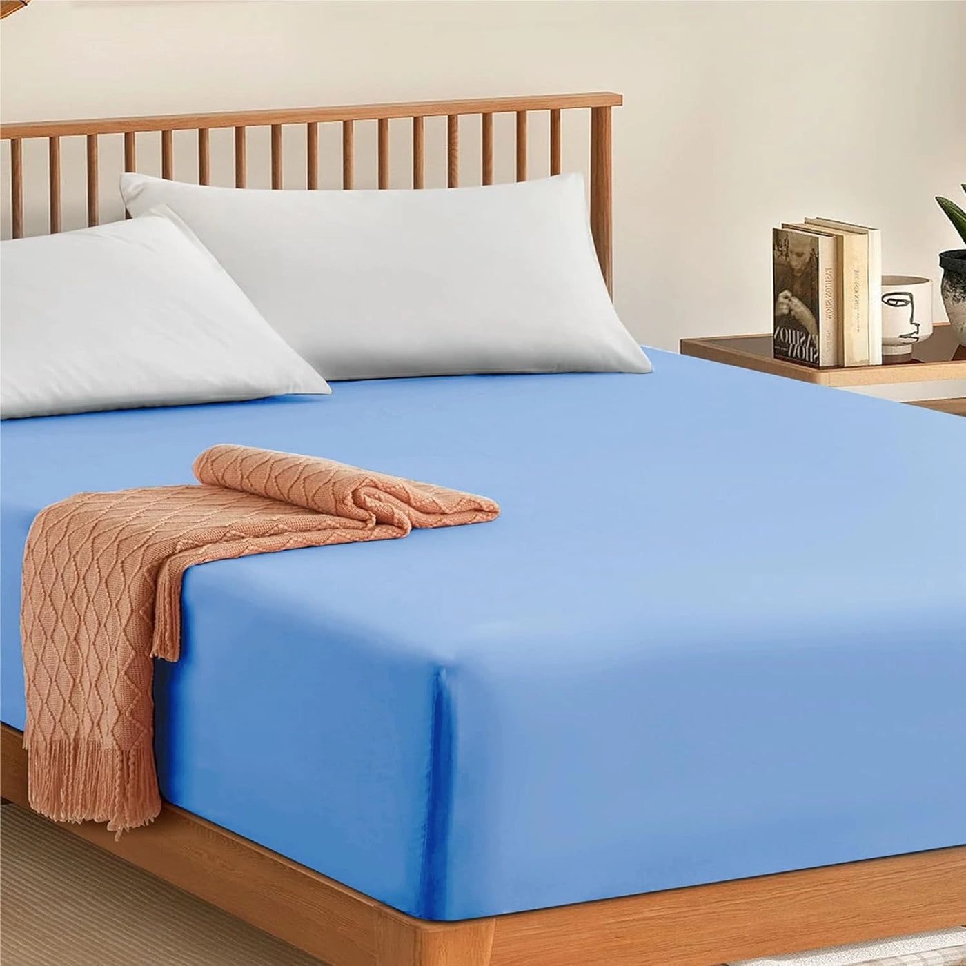 Range of cotton fitted sheet colors neatly folded