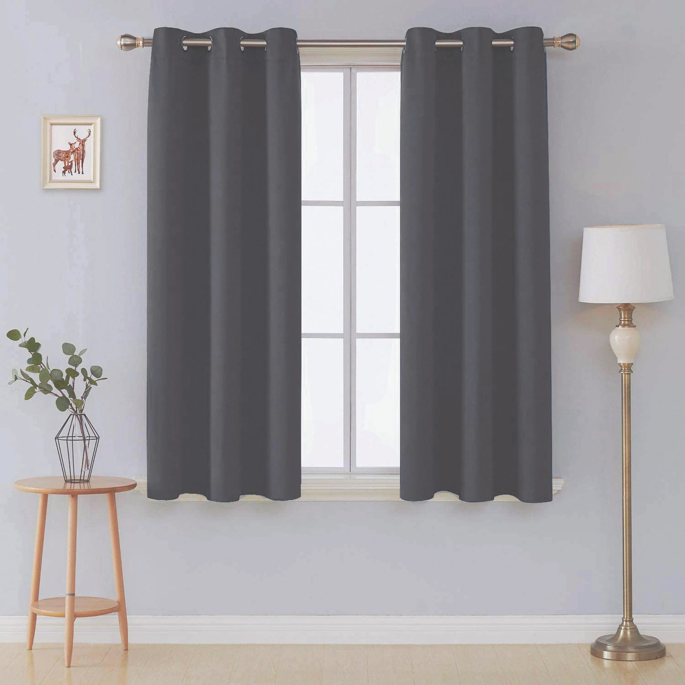  Front view of charcoal microfiber blackout curtains in a living room