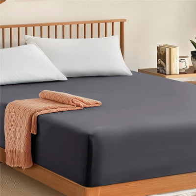 Fitted sheet with 4th corner elastic for secure fit