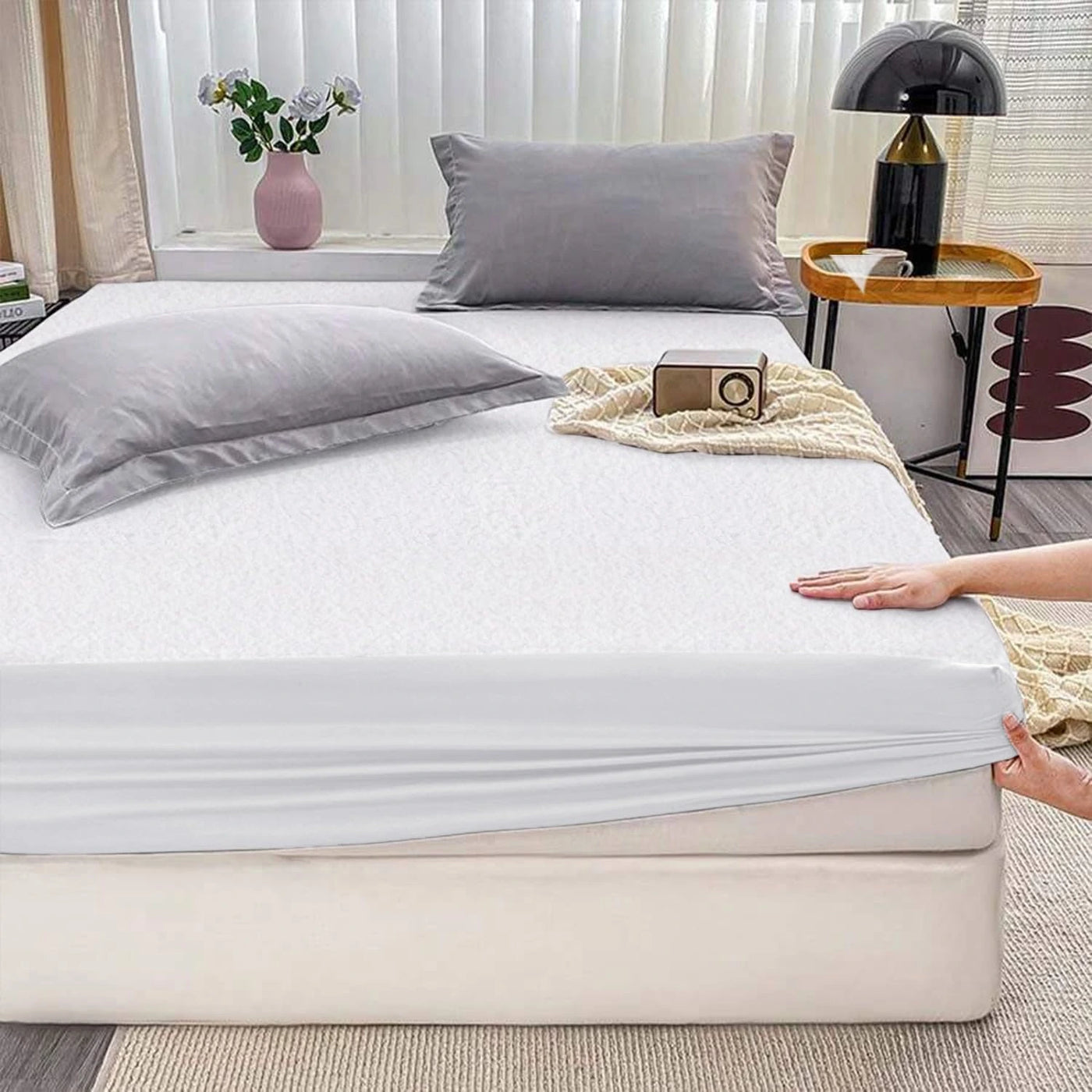 Mattress protector with all-around elastic for secure fit