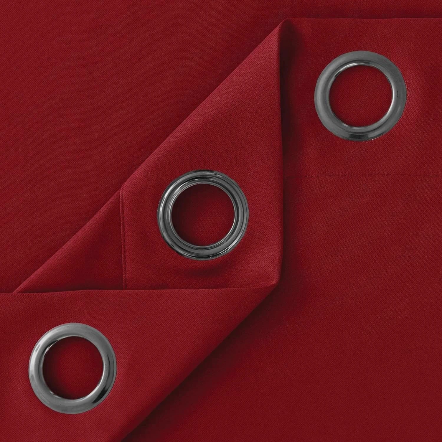 Folded red microfiber blackout curtains showing fabric and stitching