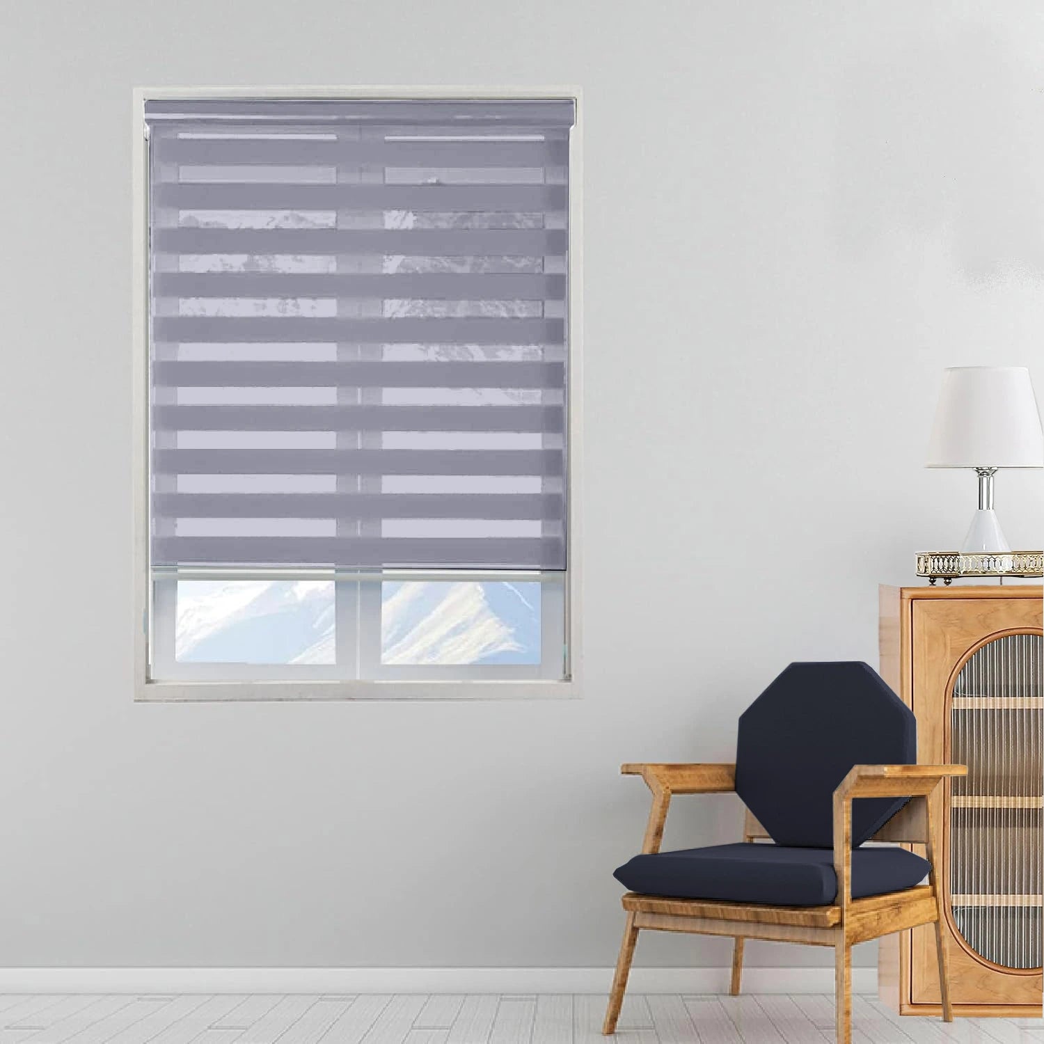 Front view of grey zebra day and night roller blinds installed on window