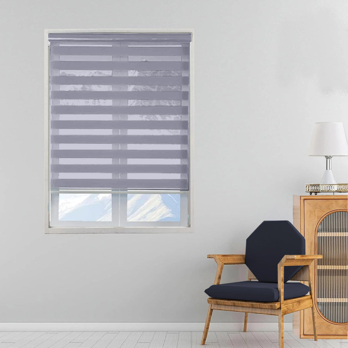 Front view of grey zebra day and night roller blinds installed on window