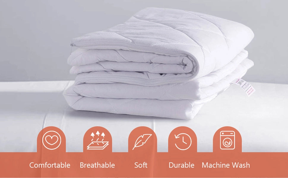  Quilted microfiber pillow protectors placed on a made bed