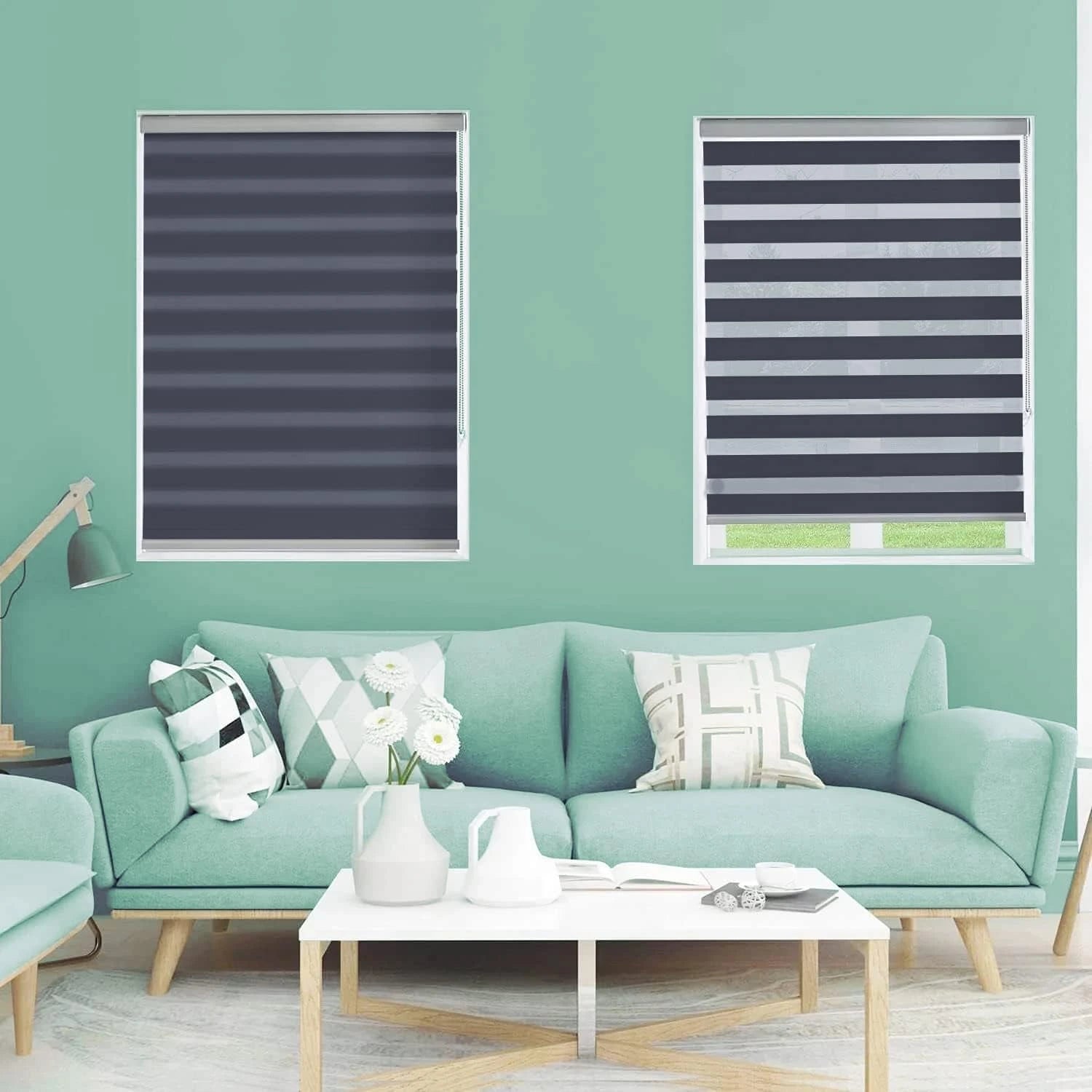 Stylish room interior with black zebra blinds adding modern touch