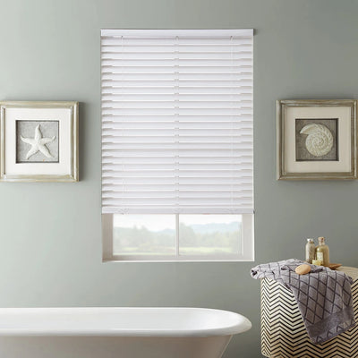 Front view of white faux wood Venetian blind with string ladders and 50mm slats fully installed