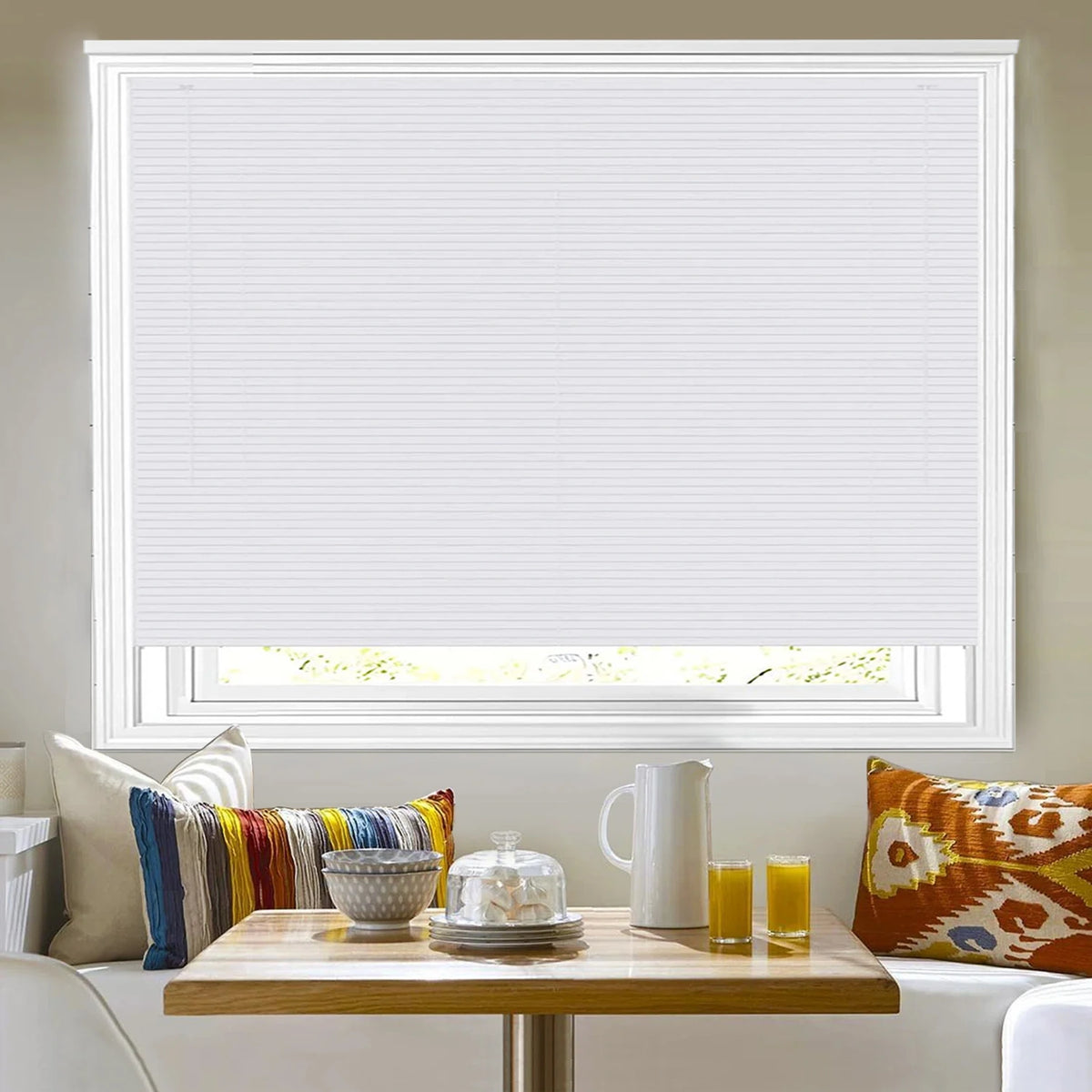 White PVC Venetian blinds with 25mm slats shown fully closed on a window.

