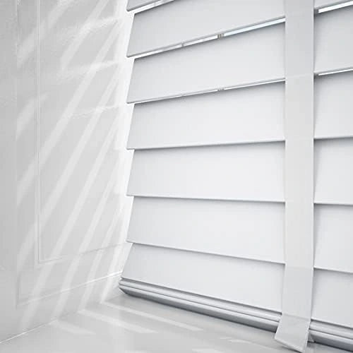 Side angle of white faux wood blind showing control cords and tilt mechanism