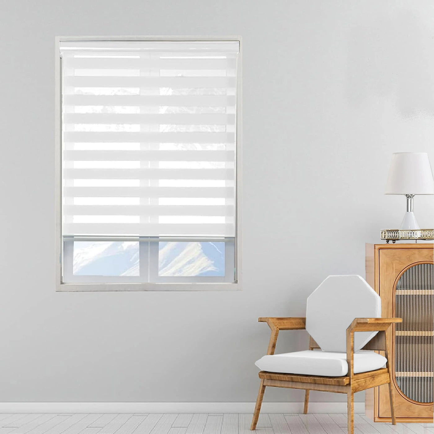  Front view of white day and night zebra roller blind installed on window