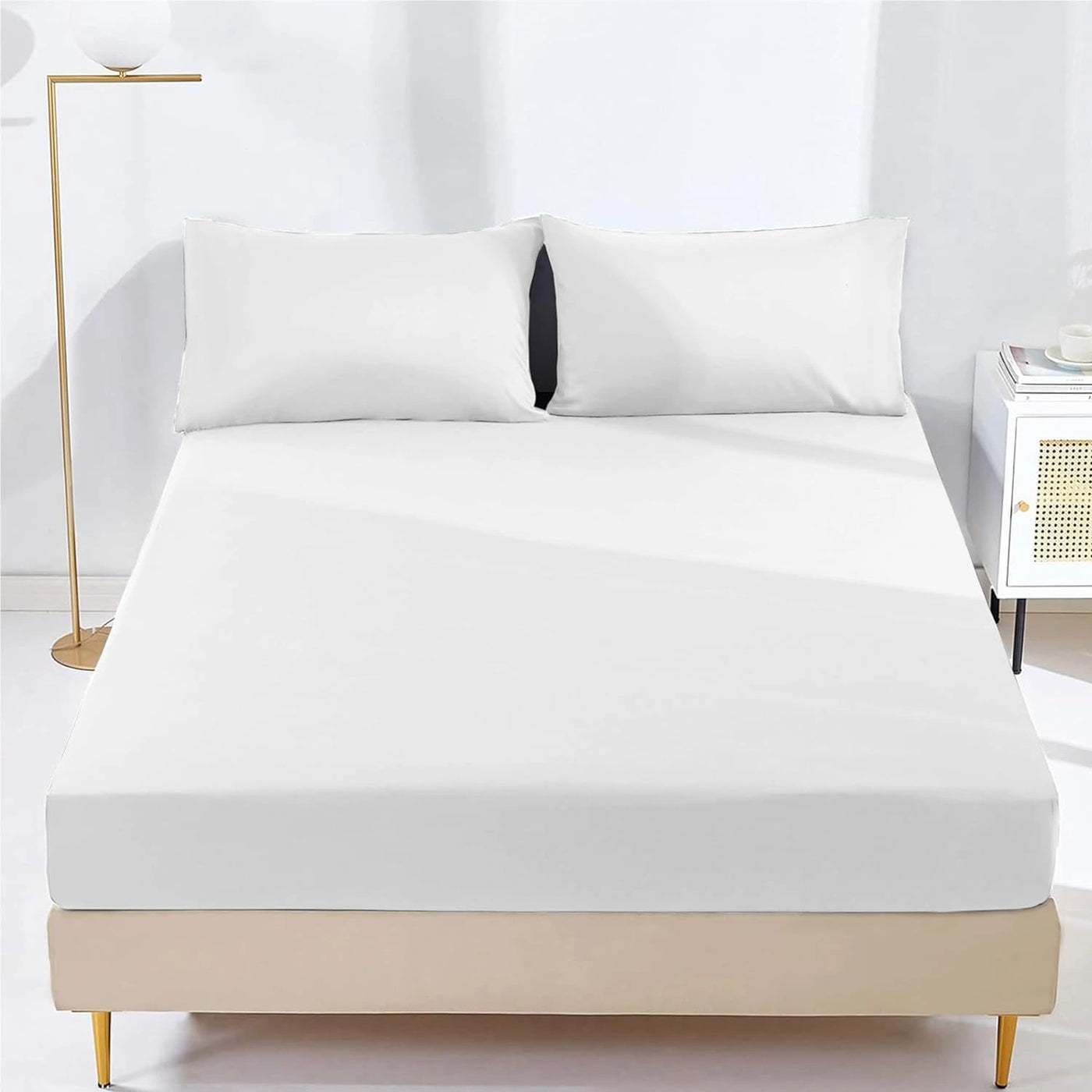 Microfiber fitted sheet snugly covering mattress
