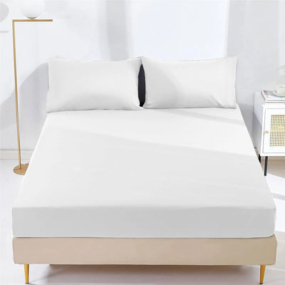 Microfiber fitted sheet snugly covering mattress
